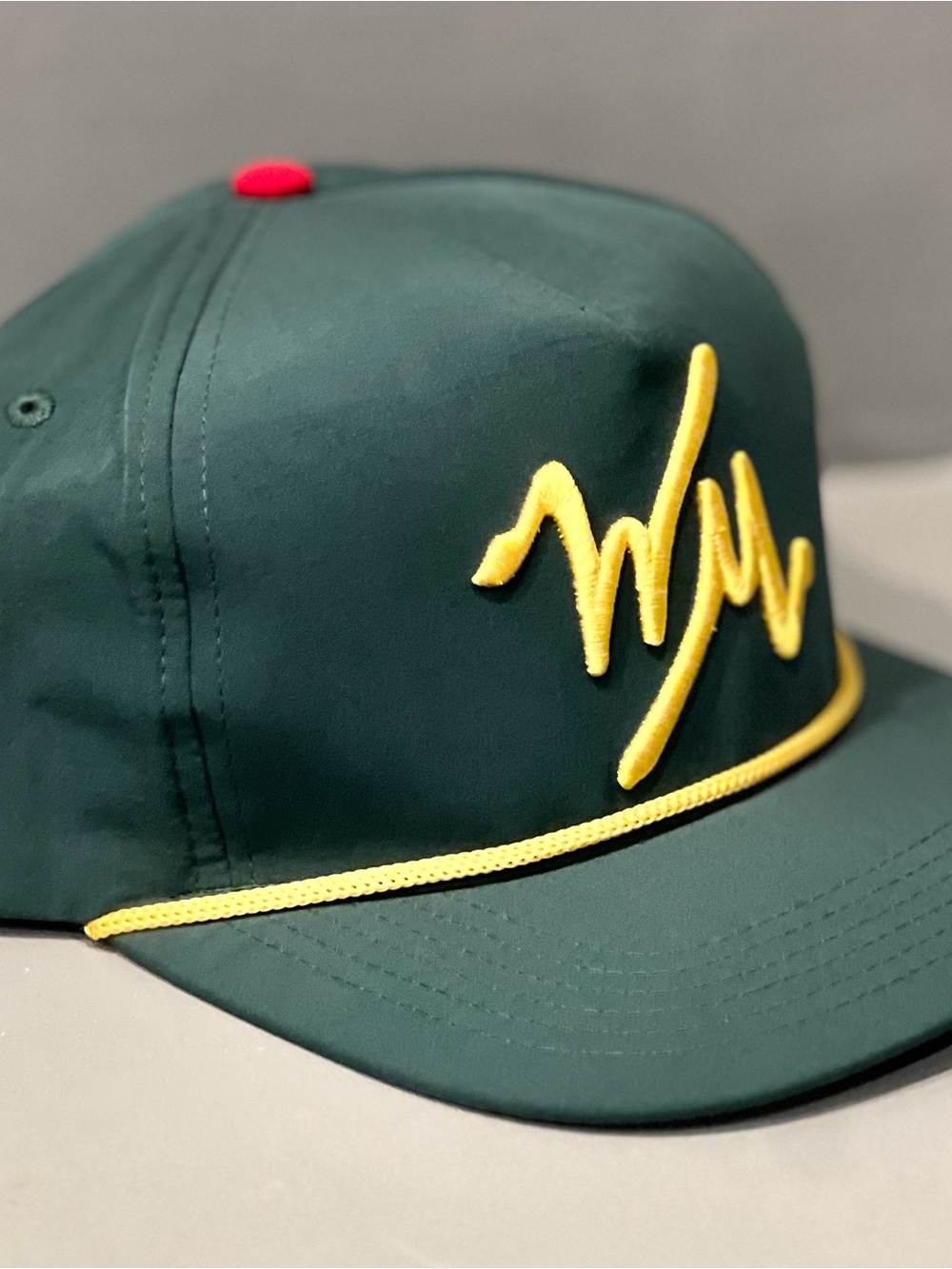 William Murray Golf Dark Green Cap with Yellow Script and Rope